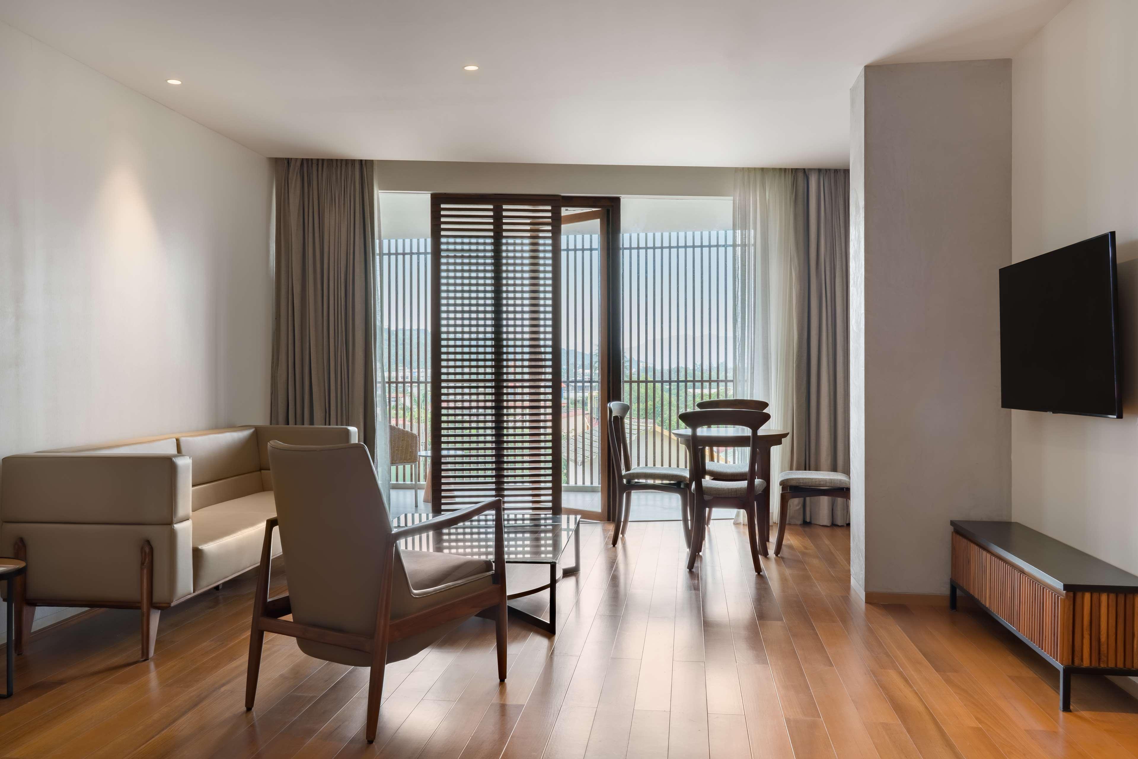 Radisson Resort And Spa Lonavala Extérieur photo A typical living room in a typical apartment