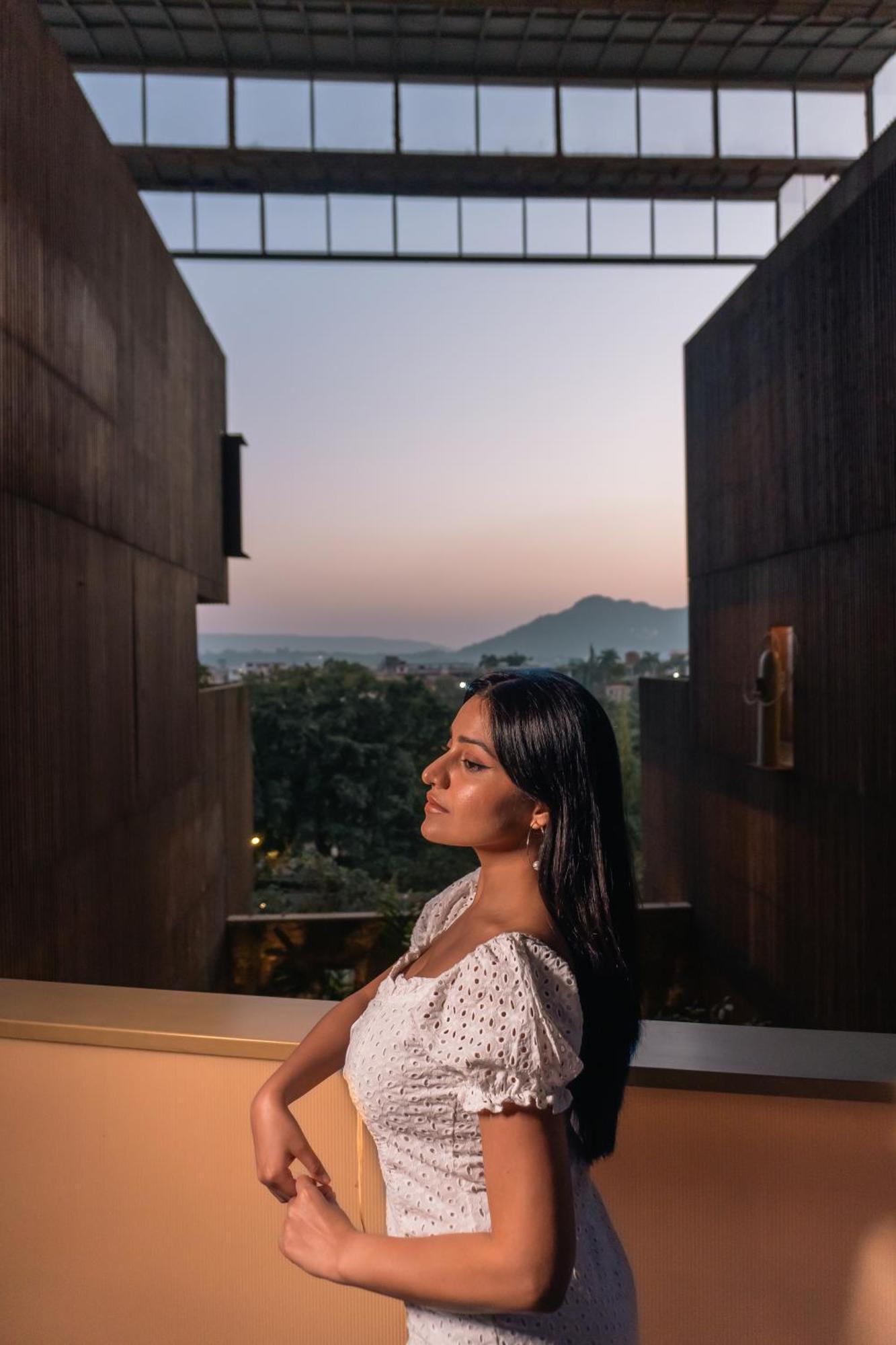 Radisson Resort And Spa Lonavala Extérieur photo A woman in contemplation
